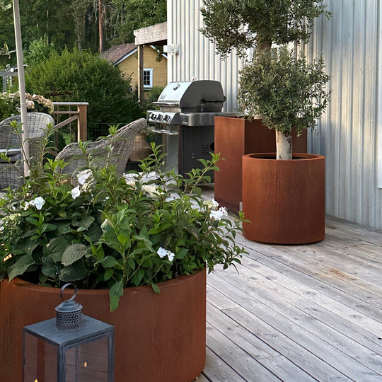 Runde plantekasser med buet kant